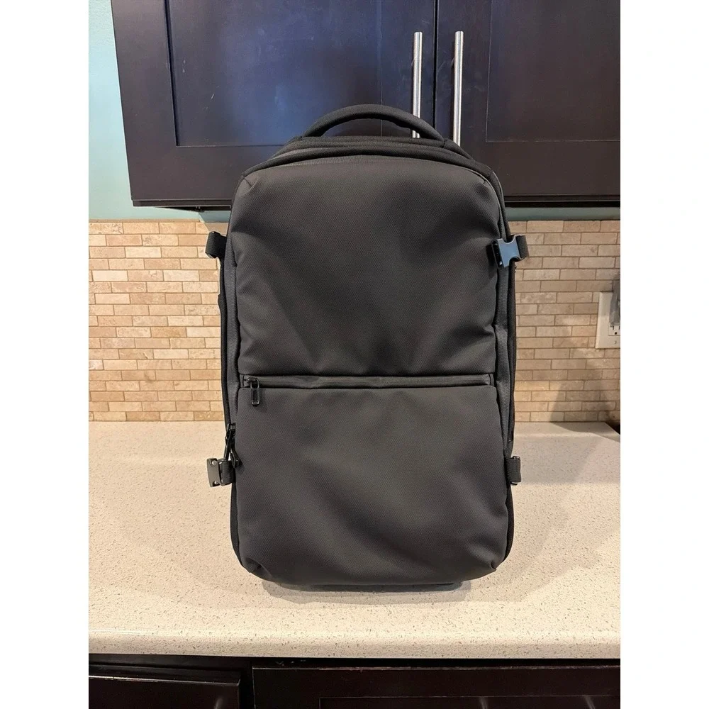 Renzhetx Rolling Backpack